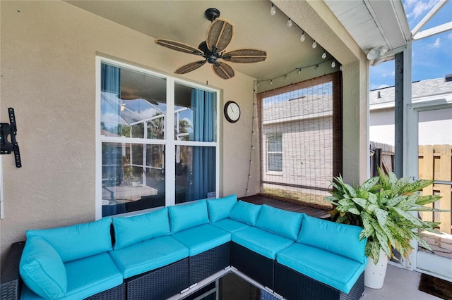 sunroom with an outdoor living space, a ceiling fan, and track lighting
