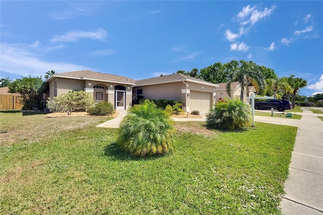 single story home with concrete driveway, stucco siding, a front lawn, and a garage