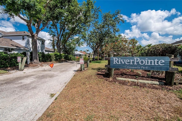 community / neighborhood sign featuring driveway