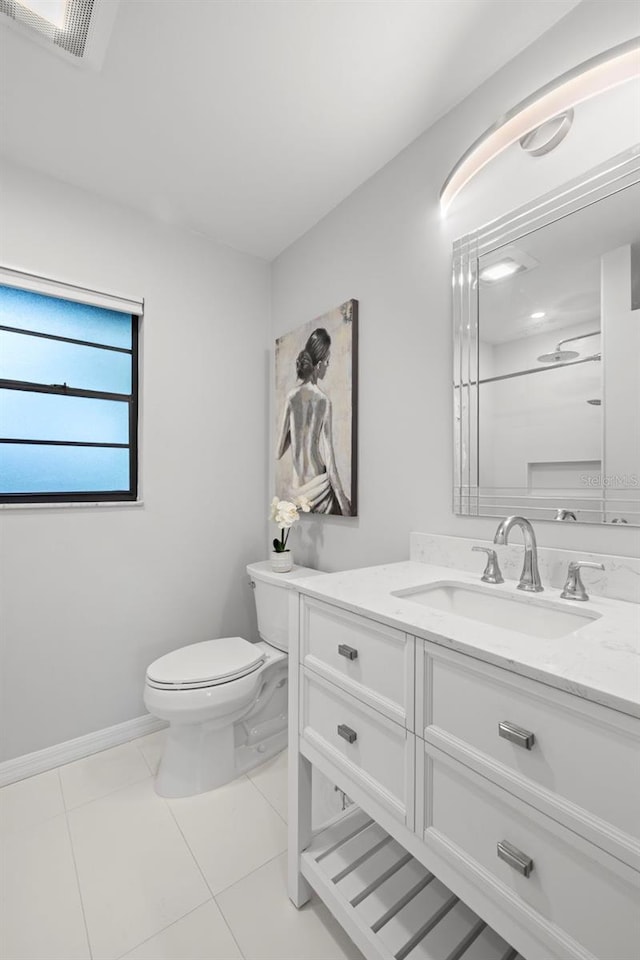 1047 Deer Hollow Way, Sarasota, FL 34232 - bathroom featuring tile patterned floors, toilet, visible vents, baseboards, and vanity