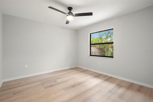 1047 Deer Hollow Way, Sarasota, FL 34232 - spare room with baseboards, a ceiling fan, and light wood finished floors