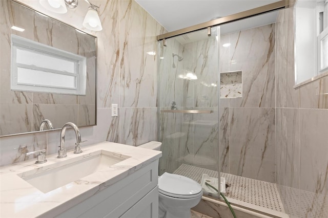 full bathroom featuring tasteful backsplash, vanity, toilet, a marble finish shower, and tile walls