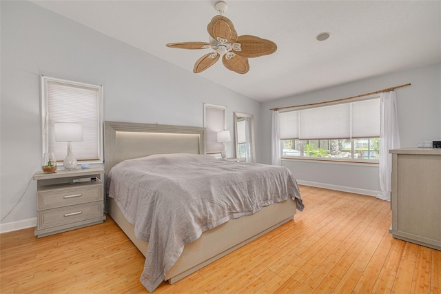 4490 38th Way S, Saint Petersburg, FL 33711 - bedroom featuring light wood-type flooring, baseboards, vaulted ceiling, and a ceiling fan