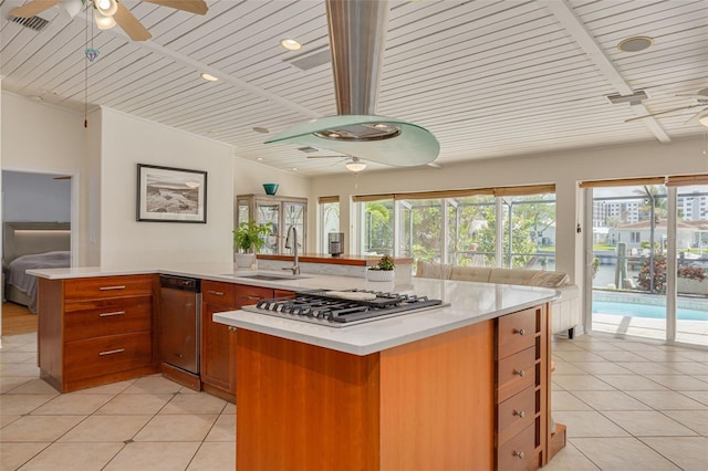 4490 38th Way S, Saint Petersburg, FL 33711 - kitchen with light tile patterned flooring, ceiling fan, a sink, and gas cooktop