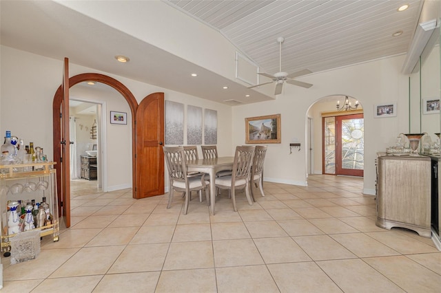 4490 38th Way S, Saint Petersburg, FL 33711 - dining area with light tile patterned floors, recessed lighting, arched walkways, and ceiling fan with notable chandelier
