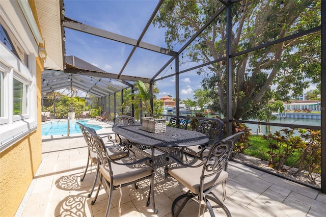 4490 38th Way S, Saint Petersburg, FL 33711 - view of patio featuring outdoor dining area, an outdoor pool, and a lanai