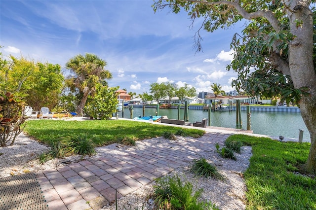 4490 38th Way S, Saint Petersburg, FL 33711 - exterior space featuring a water view, a boat dock, boat lift, and a lawn
