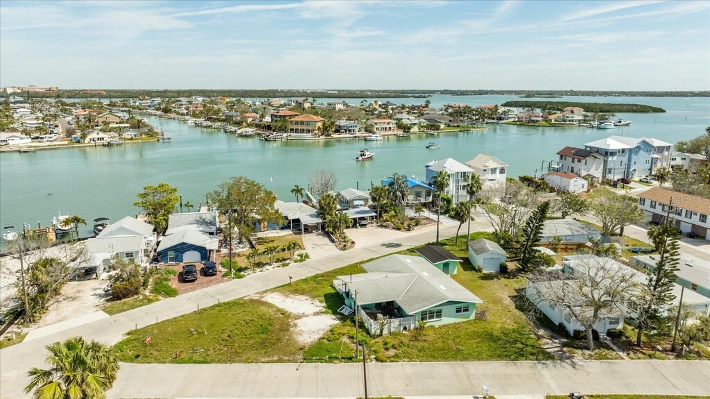 13330 Boca Ciega Ave, Madeira Beach, FL 33708 - aerial view with a water view and a residential view