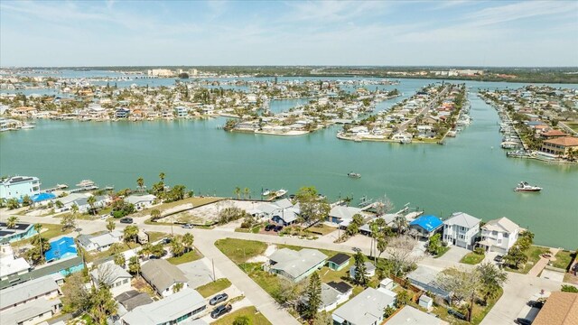 bird's eye view featuring a water view and a residential view