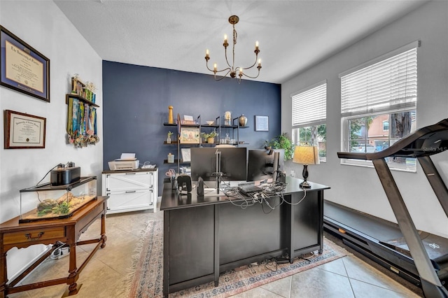 office space with tile patterned floors and a notable chandelier