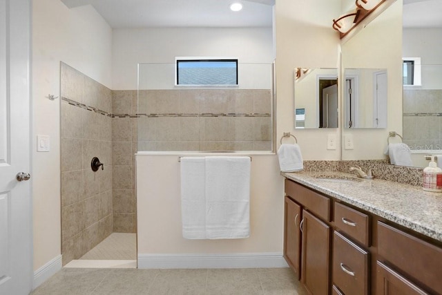1214 Florablu Dr, Seffner, FL 33584 - full bath featuring walk in shower, vanity, and tile patterned floors