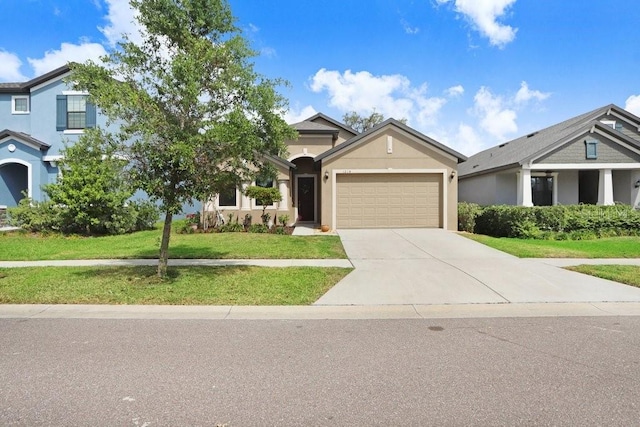 1214 Florablu Dr, Seffner, FL 33584 - view of front of house with driveway, an attached garage, stucco siding, and a front yard