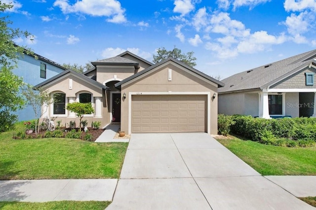 1214 Florablu Dr, Seffner, FL 33584 - view of front of house with a garage, stucco siding, driveway, and a front yard