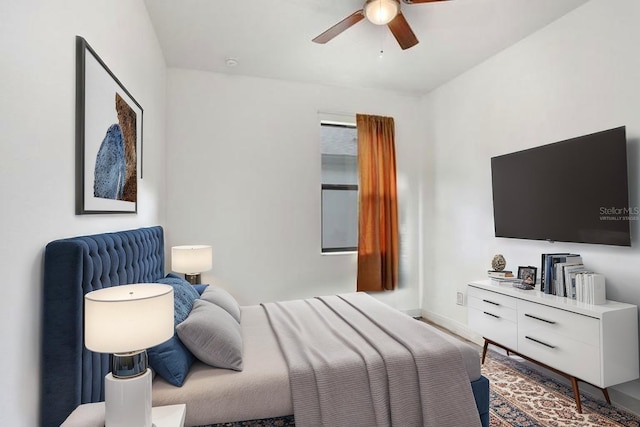 1214 Florablu Dr, Seffner, FL 33584 - bedroom with baseboards and a ceiling fan