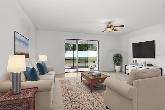1214 Florablu Dr, Seffner, FL 33584 - living area with a ceiling fan and baseboards