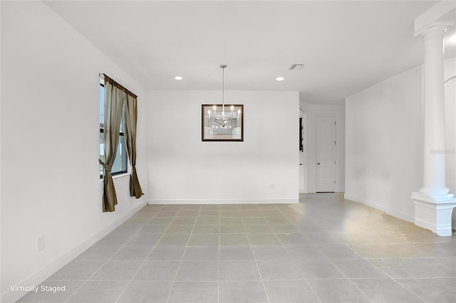 1214 Florablu Dr, Seffner, FL 33584 - spare room featuring ornate columns, recessed lighting, and light tile patterned floors