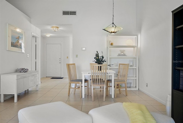6191 Bahia Del Mar Blvd Unit 204, Saint Petersburg, FL 33715 - dining space featuring visible vents, baseboards, and light tile patterned flooring