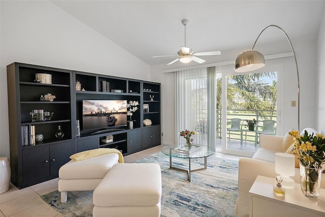 6191 Bahia Del Mar Blvd Unit 204, Saint Petersburg, FL 33715 - living room featuring light tile patterned floors, a ceiling fan, and vaulted ceiling
