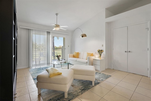 6191 Bahia Del Mar Blvd Unit 204, Saint Petersburg, FL 33715 - living room featuring light tile patterned floors, a ceiling fan, and vaulted ceiling