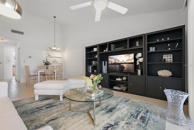 6191 Bahia Del Mar Blvd Unit 204, Saint Petersburg, FL 33715 - living area with high vaulted ceiling, light tile patterned floors, visible vents, and ceiling fan