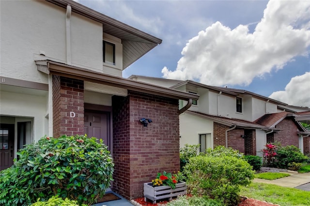 612 Fairmont Ave Unit D, Safety Harbor, FL 34695 - exterior space with brick siding and stucco siding