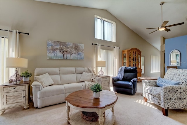 612 Fairmont Ave Unit D, Safety Harbor, FL 34695 - carpeted living room with high vaulted ceiling and ceiling fan