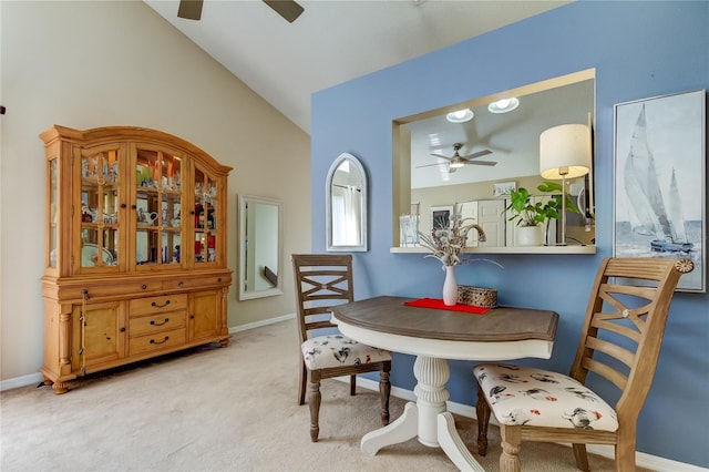612 Fairmont Ave Unit D, Safety Harbor, FL 34695 - dining room featuring light colored carpet, ceiling fan, and baseboards