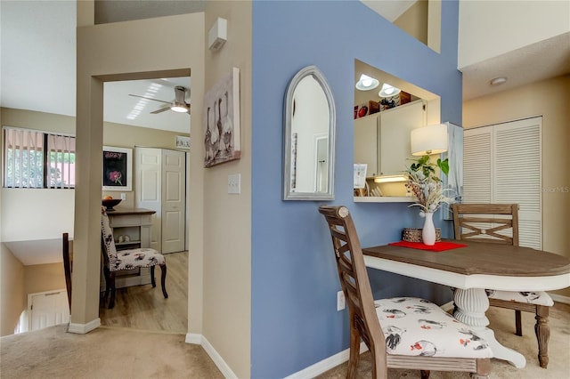 612 Fairmont Ave Unit D, Safety Harbor, FL 34695 - dining room featuring light carpet, ceiling fan, and baseboards