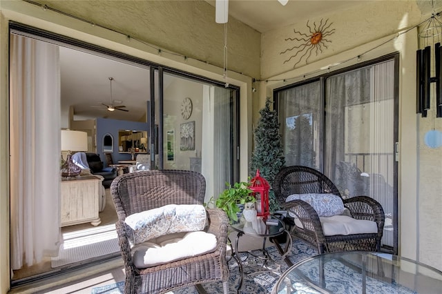 612 Fairmont Ave Unit D, Safety Harbor, FL 34695 - sunroom / solarium with ceiling fan and outdoor dining area