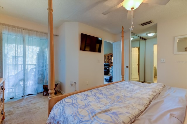 612 Fairmont Ave Unit D, Safety Harbor, FL 34695 - carpeted bedroom with visible vents and ceiling fan
