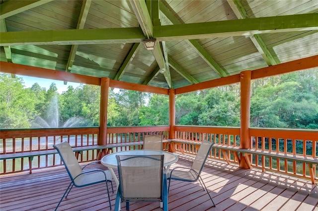 612 Fairmont Ave Unit D, Safety Harbor, FL 34695 - wooden terrace featuring a gazebo and outdoor dining area