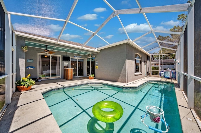 19750 Ellendale Dr, Land O Lakes, FL 34638 - swimming pool with a patio, ceiling fan, and a lanai