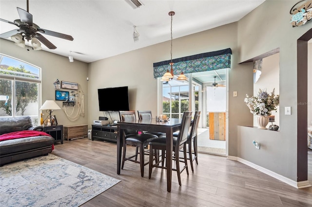 19750 Ellendale Dr, Land O Lakes, FL 34638 - dining space featuring ceiling fan and wood finished floors