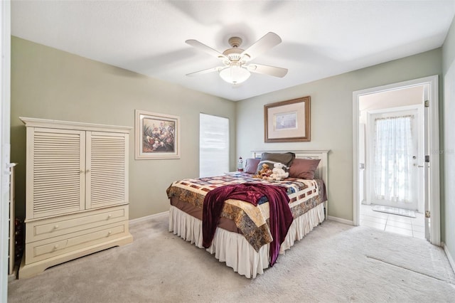 19750 Ellendale Dr, Land O Lakes, FL 34638 - bedroom featuring light colored carpet and a ceiling fan