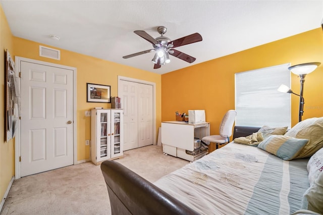 19750 Ellendale Dr, Land O Lakes, FL 34638 - bedroom with carpet, a closet, and a ceiling fan