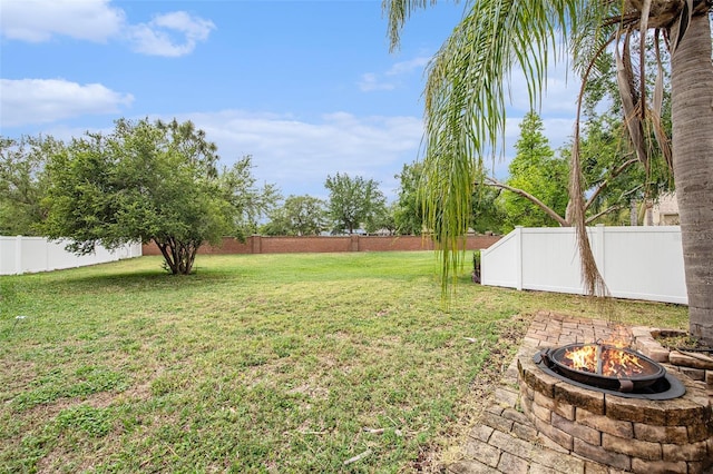 6711 Thackston Dr, Riverview, FL 33578 - view of yard with a fire pit