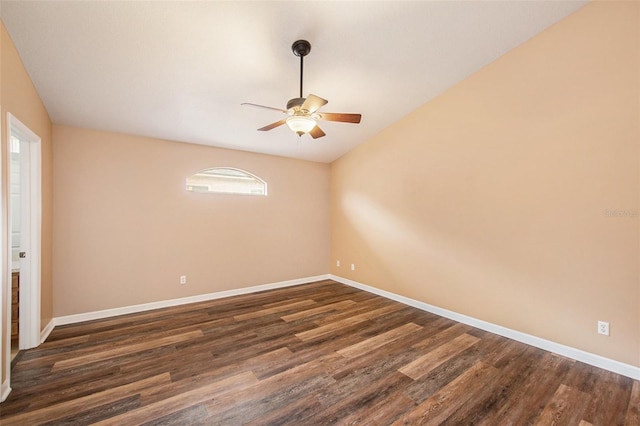 6711 Thackston Dr, Riverview, FL 33578 - empty room featuring a ceiling fan, dark wood-style floors, and baseboards