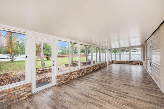 6711 Thackston Dr, Riverview, FL 33578 - unfurnished sunroom with wood finished floors and plenty of natural light