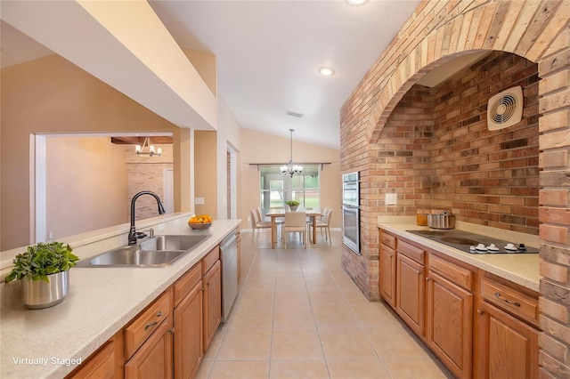 6711 Thackston Dr, Riverview, FL 33578 - kitchen with a sink, a chandelier, appliances with stainless steel finishes, light tile patterned flooring, and vaulted ceiling