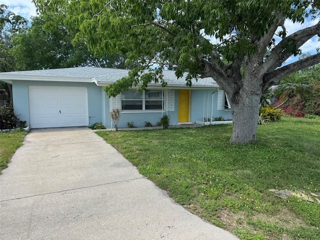 single story home with roof with shingles, stucco siding, driveway, an attached garage, and a front yard