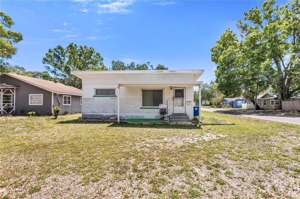 1778 27th Ave N, Saint Petersburg, FL 33713 - bungalow-style home featuring a front yard