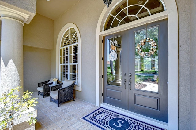 3212 Sunset Lakes Blvd, Land O Lakes, FL 34638 - entrance to property with french doors and stucco siding