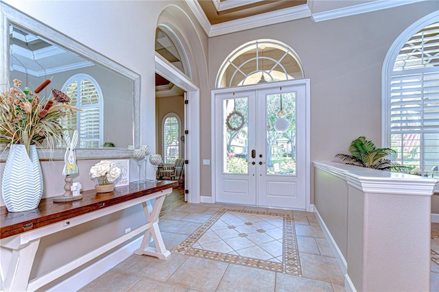 3212 Sunset Lakes Blvd, Land O Lakes, FL 34638 - foyer featuring ornamental molding, baseboards, french doors, and a towering ceiling