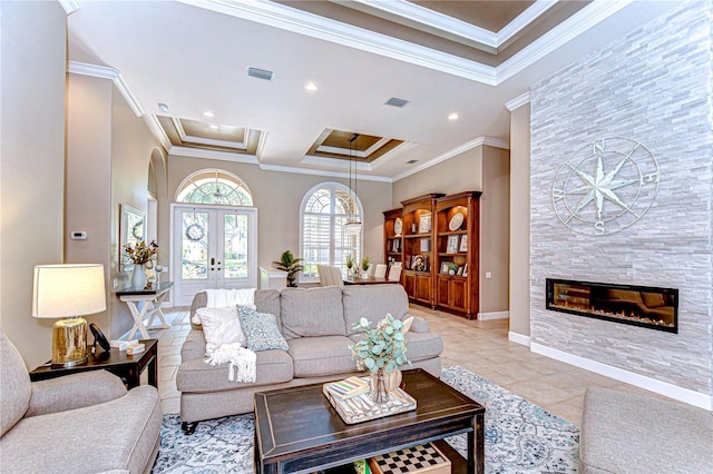 3212 Sunset Lakes Blvd, Land O Lakes, FL 34638 - living area with crown molding, a fireplace, french doors, recessed lighting, and light tile patterned floors