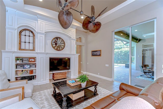 3212 Sunset Lakes Blvd, Land O Lakes, FL 34638 - living area featuring light tile patterned floors, built in features, recessed lighting, and baseboards