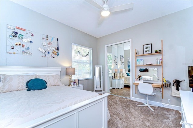 3212 Sunset Lakes Blvd, Land O Lakes, FL 34638 - bedroom featuring carpet floors, a closet, a desk, baseboards, and a ceiling fan