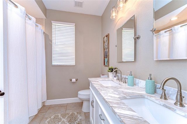 3212 Sunset Lakes Blvd, Land O Lakes, FL 34638 - bathroom with toilet, tile patterned flooring, baseboards, double vanity, and a shower with shower curtain