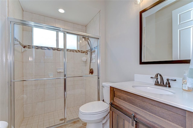 3212 Sunset Lakes Blvd, Land O Lakes, FL 34638 - bathroom featuring a shower stall, toilet, and vanity