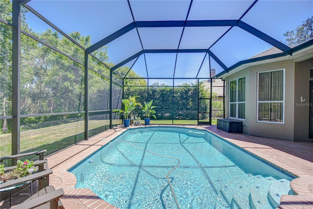 3212 Sunset Lakes Blvd, Land O Lakes, FL 34638 - swimming pool featuring a patio area and glass enclosure