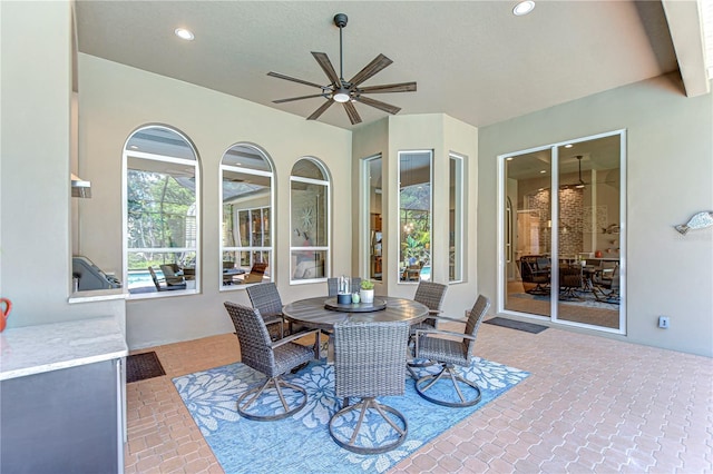3212 Sunset Lakes Blvd, Land O Lakes, FL 34638 - sunroom with ceiling fan and outdoor dining area